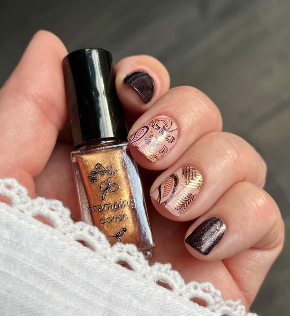 shimmery-manicure-with-art-deco-nail-art-stamping-designs