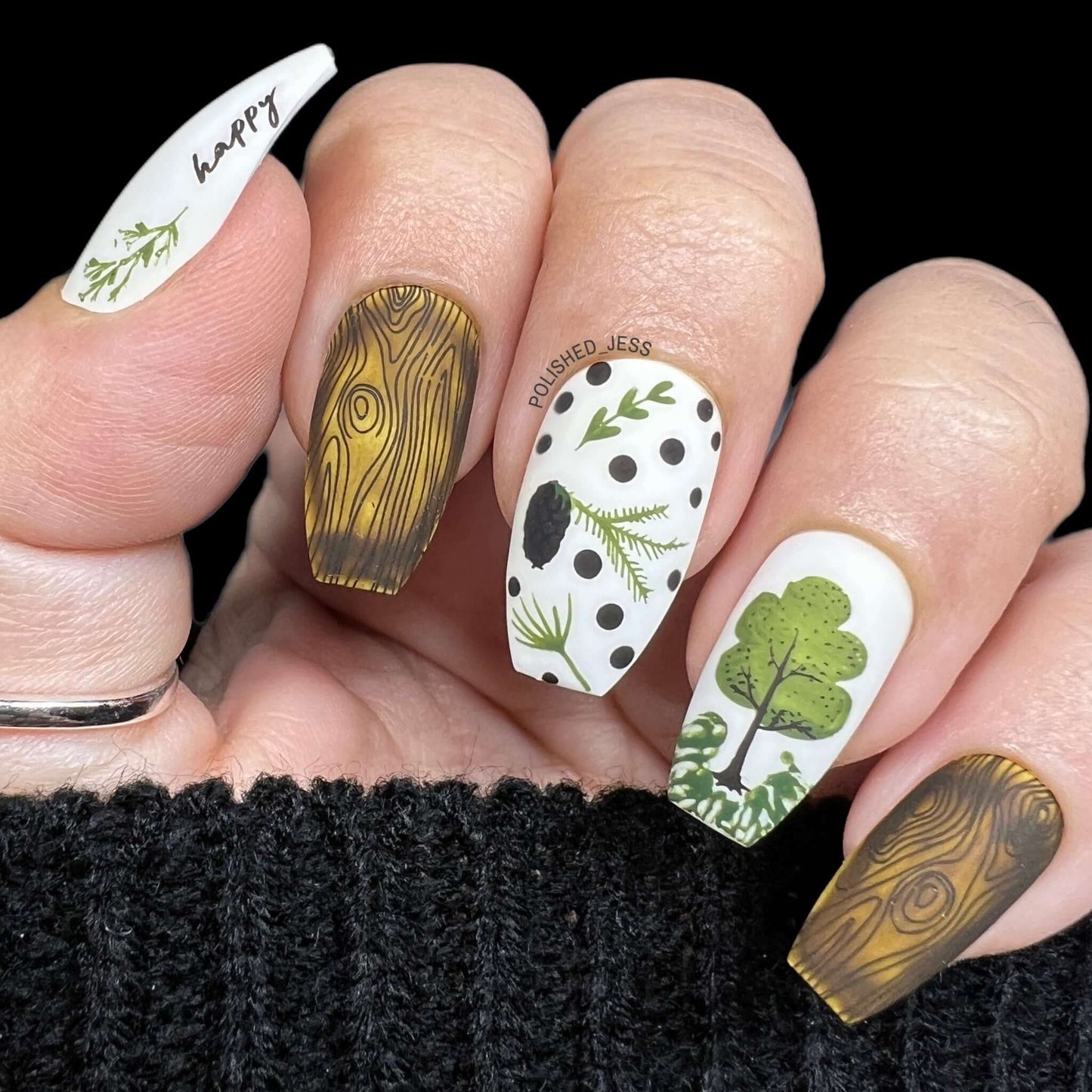 stunning-manicure-with-nail-art-designs-of-an-acorn-tree-and-full-coverage-tree-bark-pattern