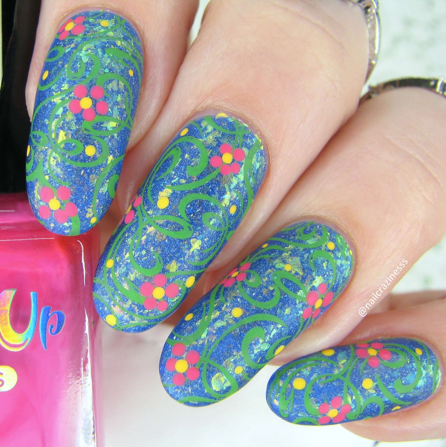 bright-manciure-with-nail-art-design-of-full-coverage-swirls-and-little-flowers