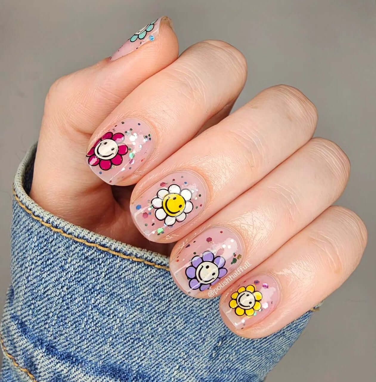 stunning-manciure-with-layered-nail-art-designs-of-retro-smiling-flowers