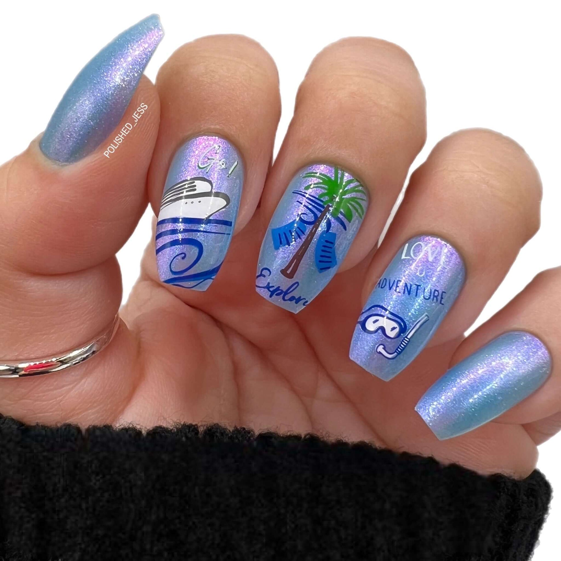 stunning-shimmery-manicure-showing-nail-art-designs-of-a-palm-tree-a-boat-and-the-words-explore-love-to-adventure