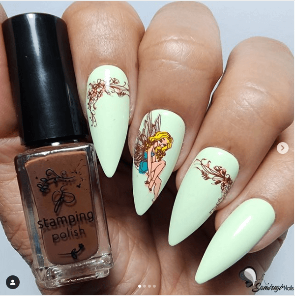 manicure-showing-nail-art-designs-of-fairies-with-floral-patterns