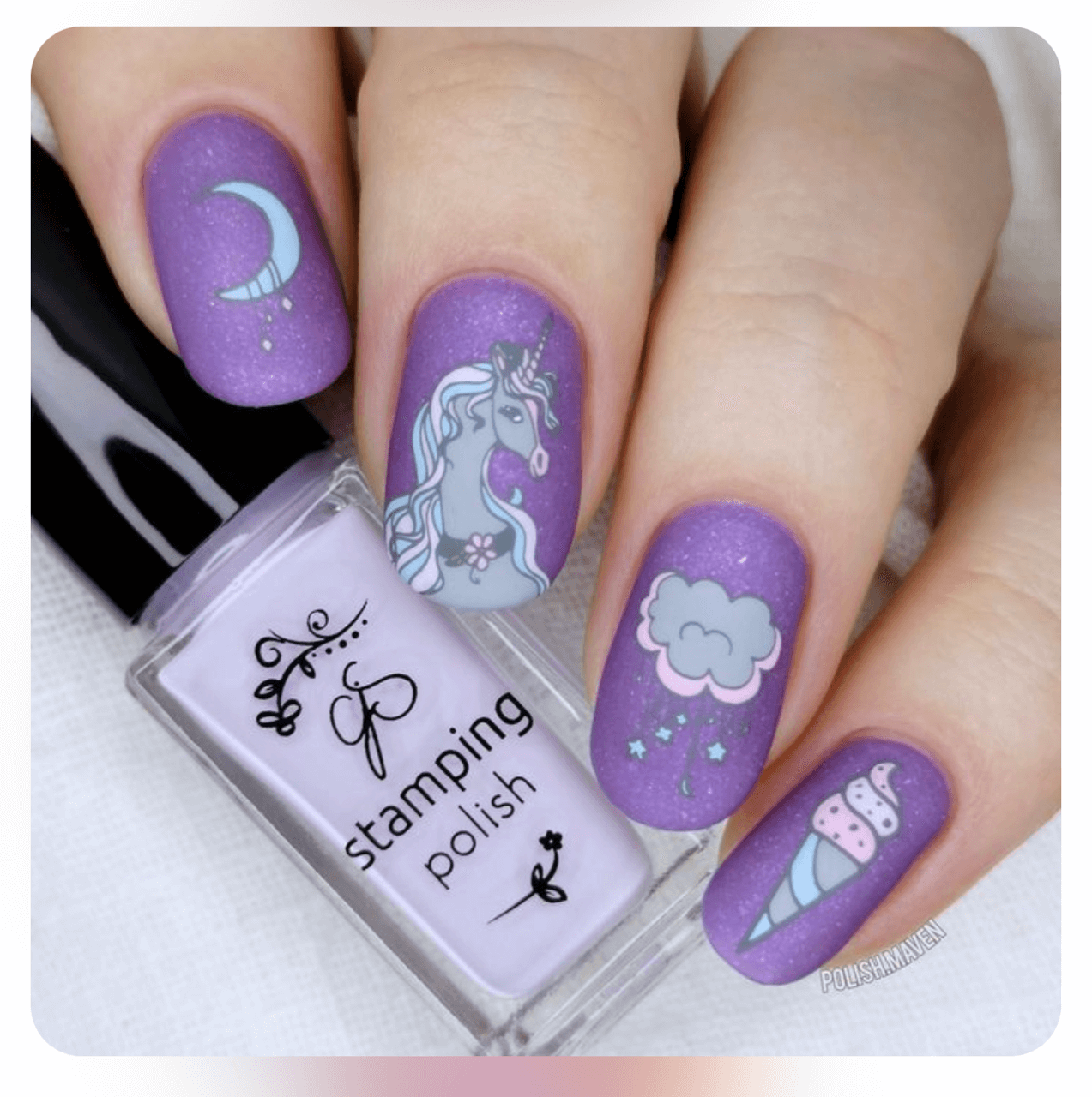 beautful-purple-manicure-showing-nail-art-designs-of-a-unicorn-with-moon-and-cloud