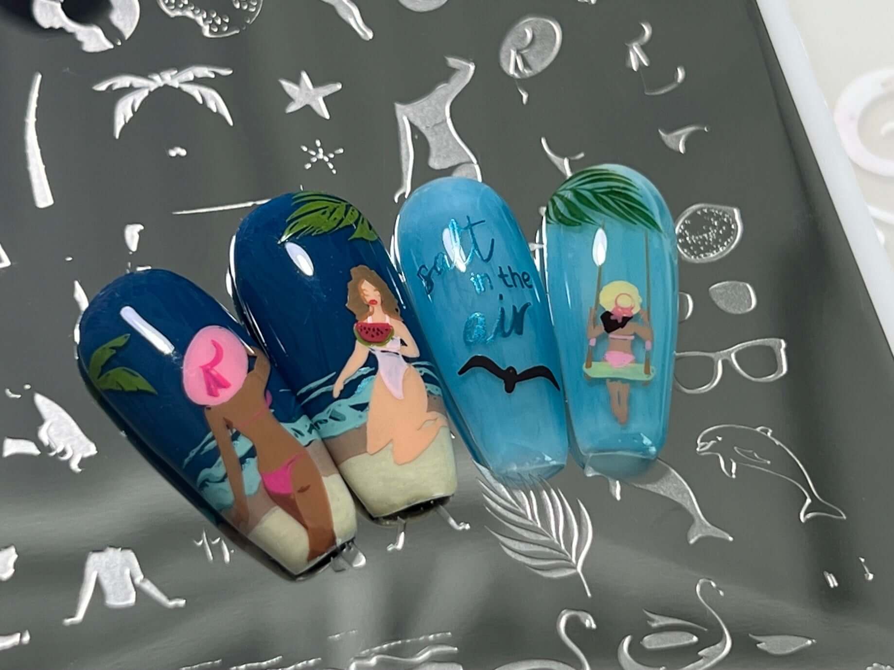 manicured-nail-tips-with-beach-nail-art-designs-of-girls-in-bikinis