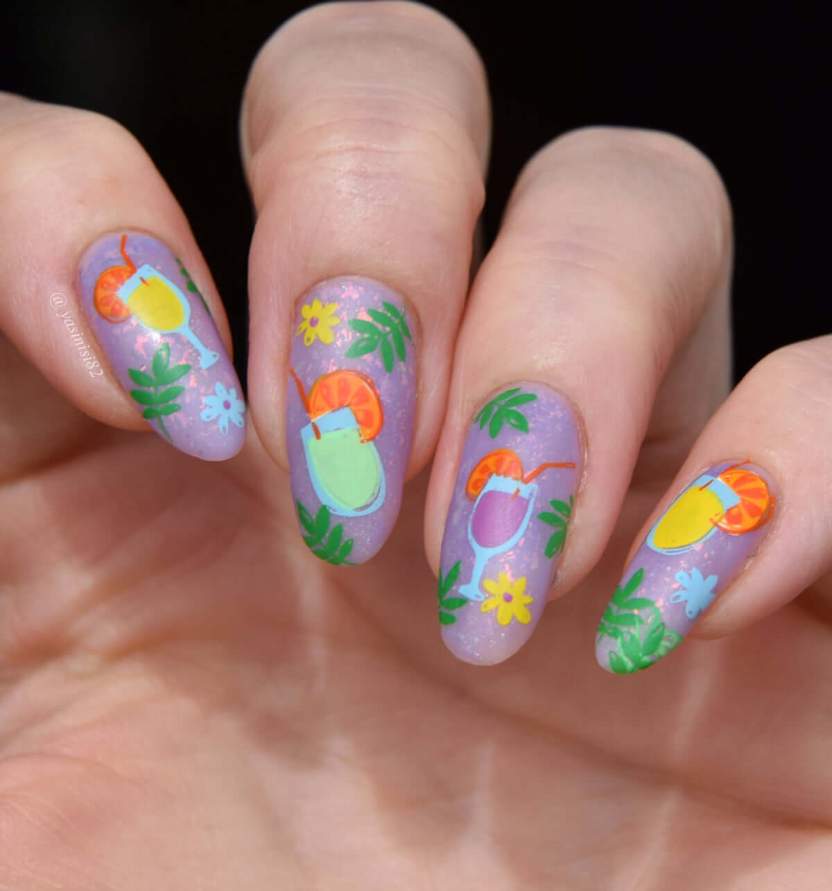 bright-manicure-showing-nail-art-designs-of-summer-drinks-with-flowers-leaves