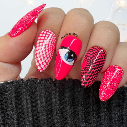 bright-hot-pink-manicure-with-abstract-nail-art-designs-of-an-eye-and-geometric-swirls