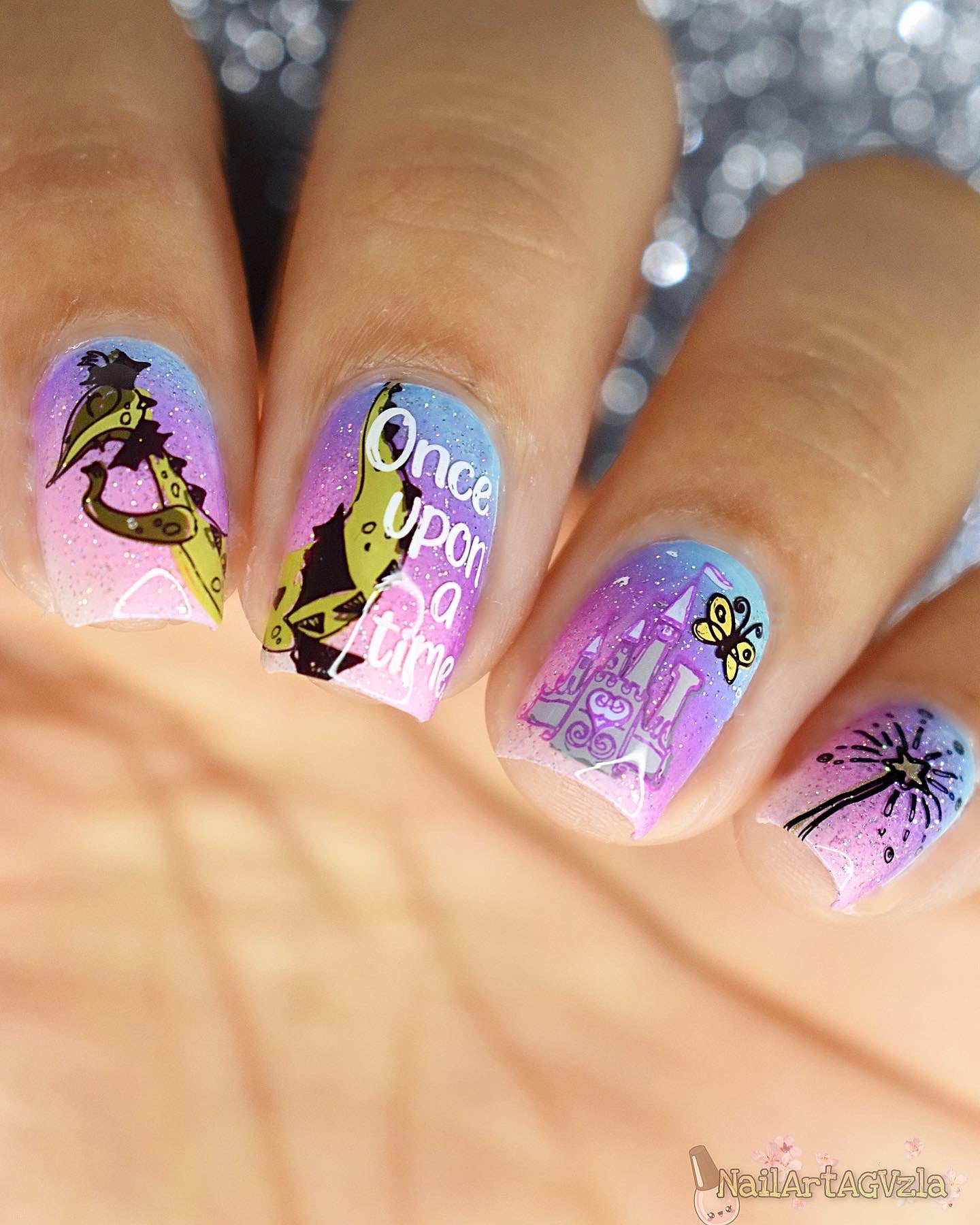 beautiful-manicure-showing-nail-art-designs-of -a-castle-dragon-and-the-words-once-upon-a-time