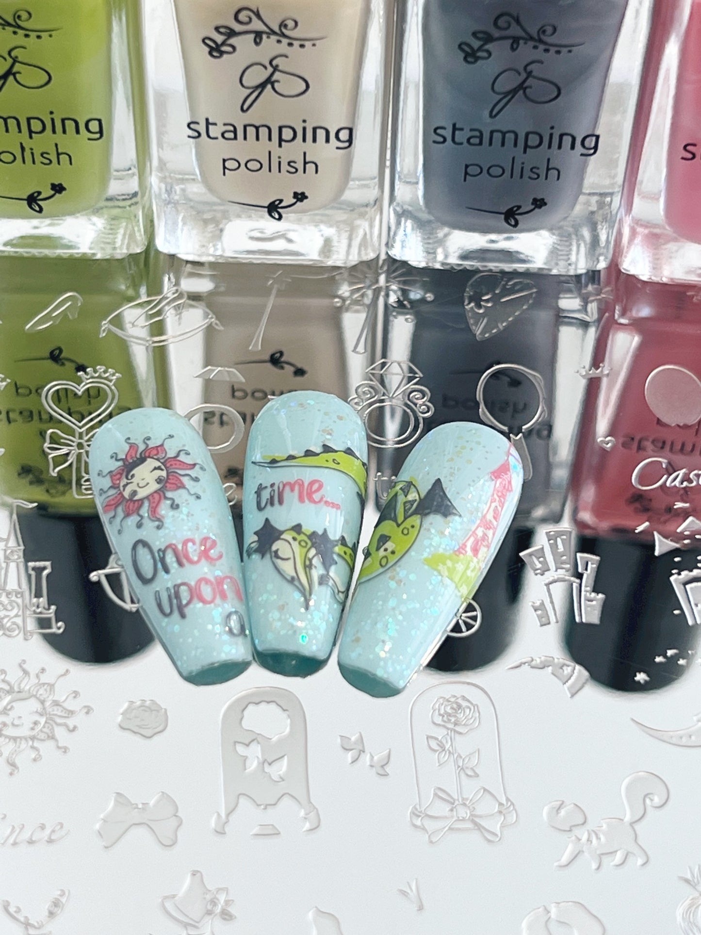 nail-tip-showing-nail-art-designs-of-a-fairy-castle-with-a-dragon