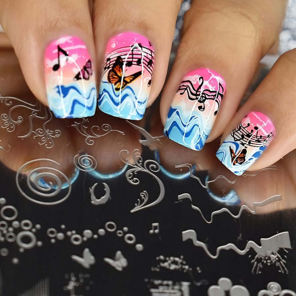 beautiful-manicure-showing-abstract-nail-art-designs-of-waves-musical-notes-and-butteflies