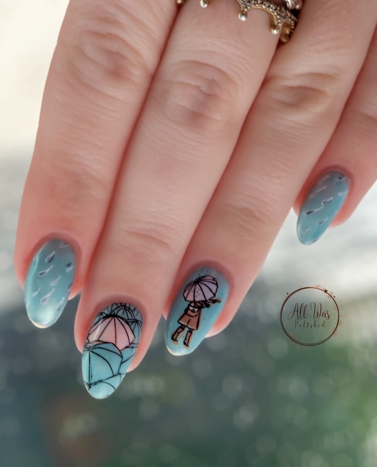 stunning-manicure-with-nail-art-designs-of-umbrellas-and-raindrops