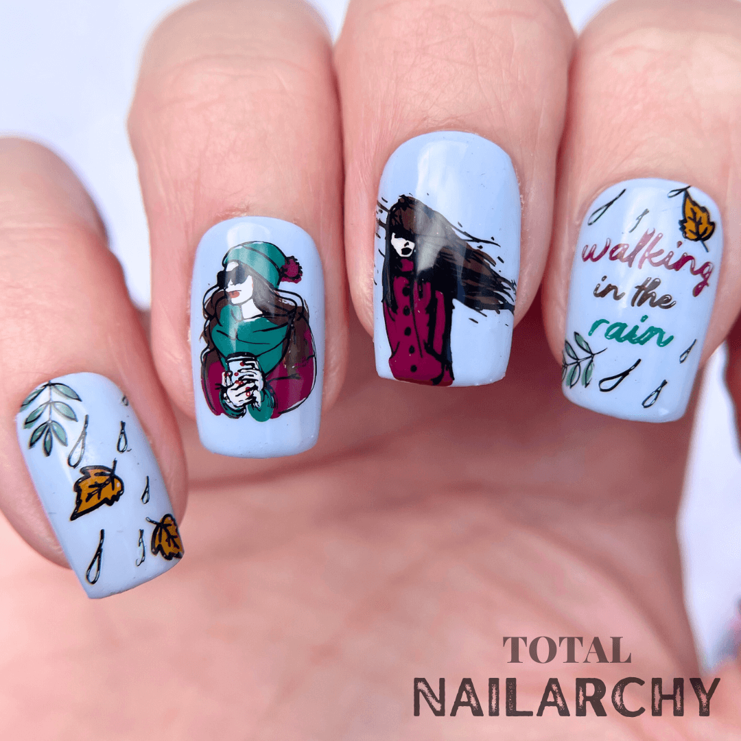 stunning-manicure-showing-nail-art-designs-of-girls-with-leaves-and-raindrops-with-the-words-walking-in-the-rain