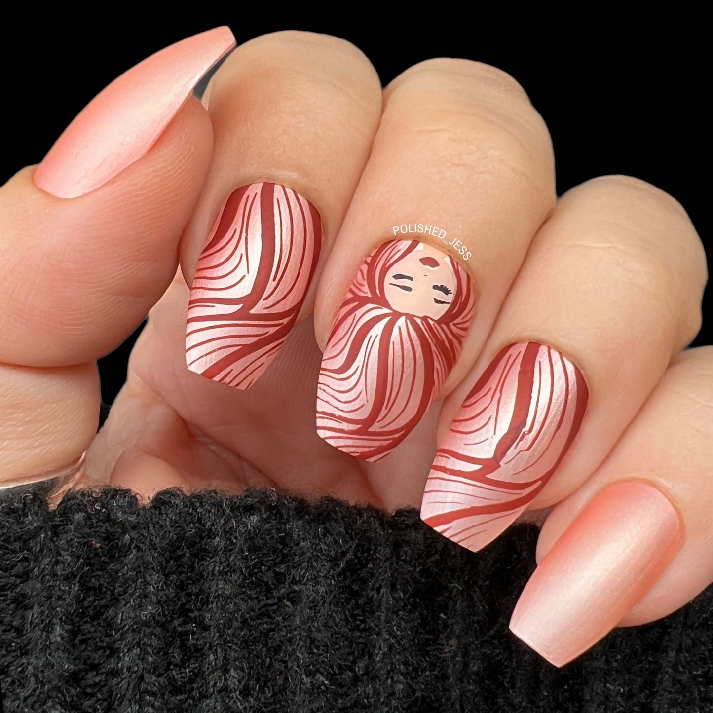 beautiful-manicure-showing-nail-art-of-a-girl-with-wavy-long-hair