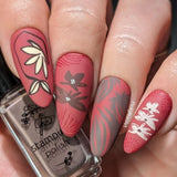 Manicure-showing-nail-art-designs-of-modern-boho-shapes-and-lily-pads