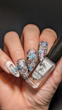 Nude-manicure-showing-full-coverage-floral-nail-art-designs-in-shimmery-polish