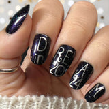 Manicure-with-the-nail-art-design-saying-dream-in-2024