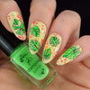 manicure-showing-abstract-nail-art-designs-of-bright-green-palm-leaves
