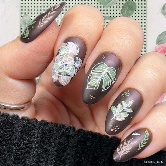 Beautiful-manicure-showing-nail-art-designs-of modern-abstract-leaves