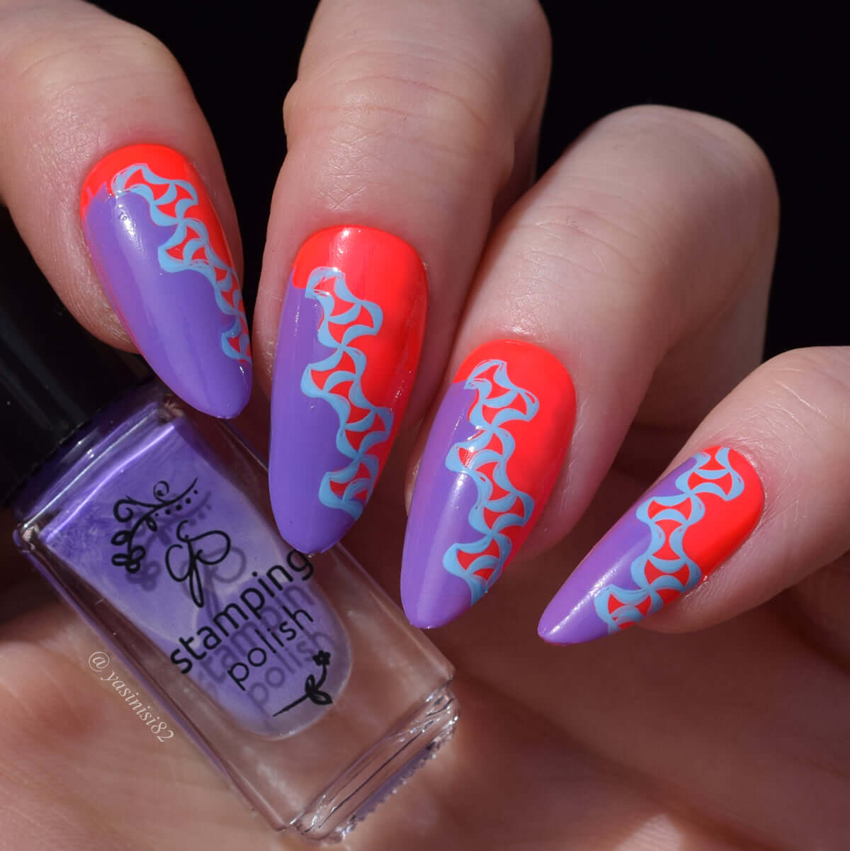 Red-and-purple-manicure-with-geometric-nail-art-designs