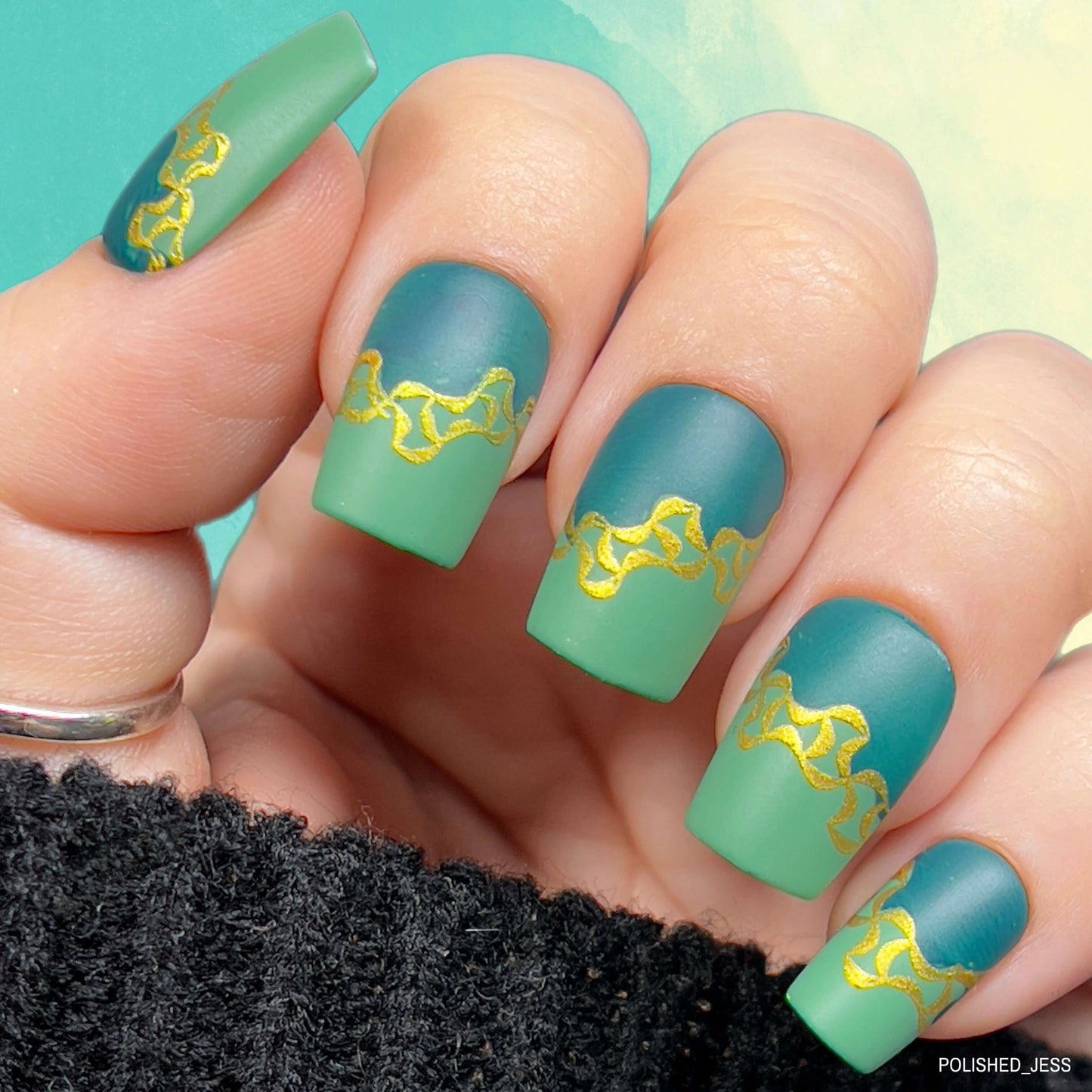 bright-green-manicure-showing-nail-art-designs-of-geometirc-pattern