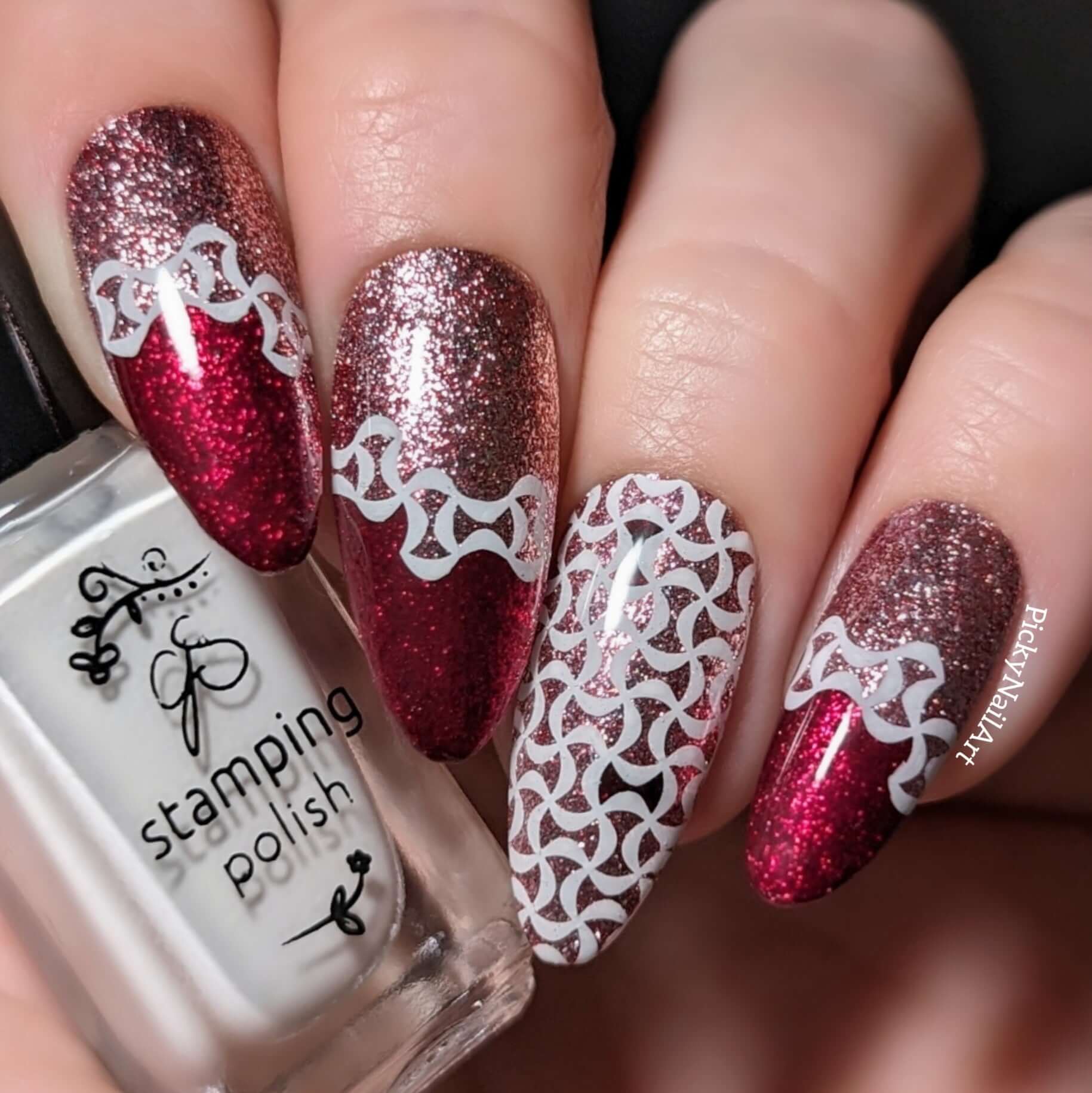 manicure-showing-nail-art-designs-of-geometric-patterns-in-red-and-white