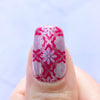 Single-nail-showing-bright-pink-manicure-with-silver-nail-art-designs-of-full-coverage-baroque-floral-pattern