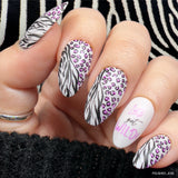 Striking-modern-black-and-white-and-pink-manicure-showing-zebra-and-cheetah-print-with-the-words-let's-get-wild