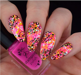 Bright-black-and-pink-manicure-showing-cheetah-print-