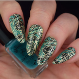 Manicure-showing-nail-art-designs-of-animal-print-patterns-in-black-and-teal