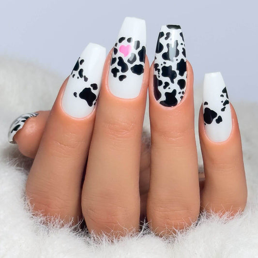 beautiful-manicure-showing-nail-art-designs-of-cow-print