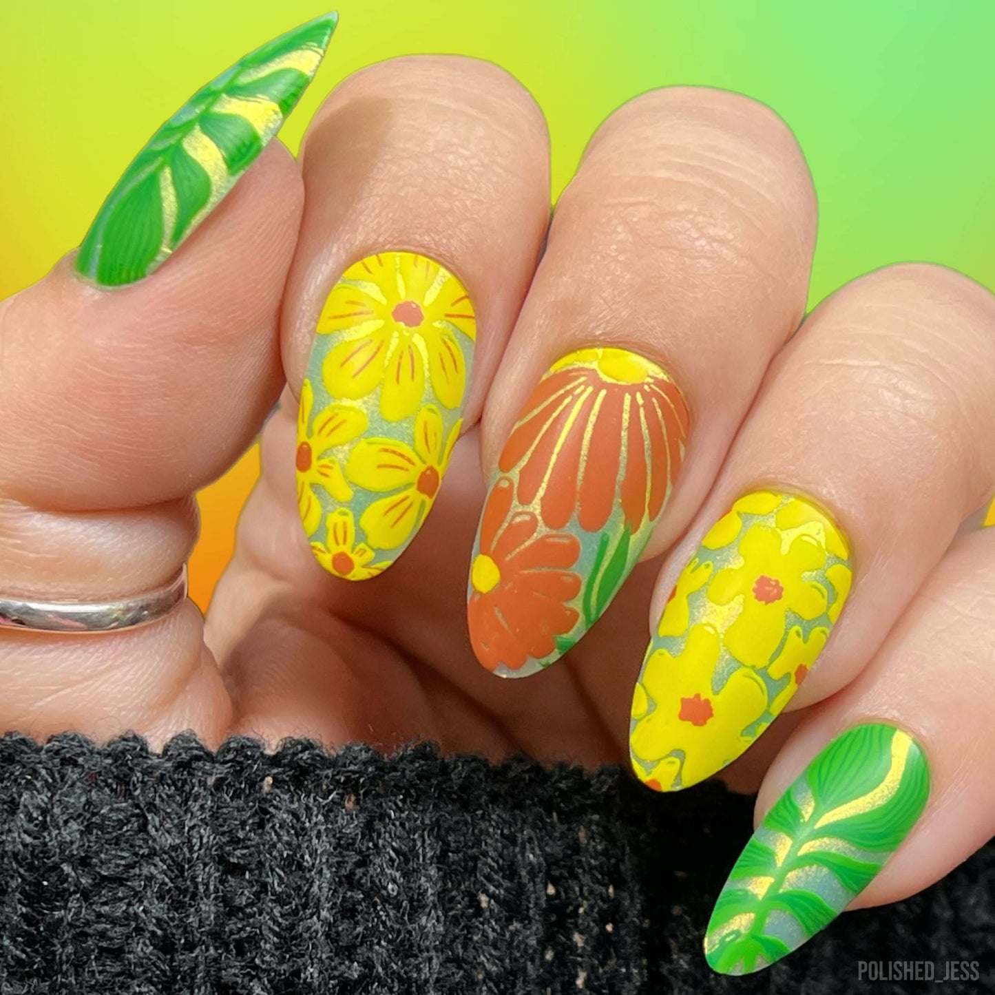 bright-manciure-with-layered-nail-art-designs-of-modern-flower-heads