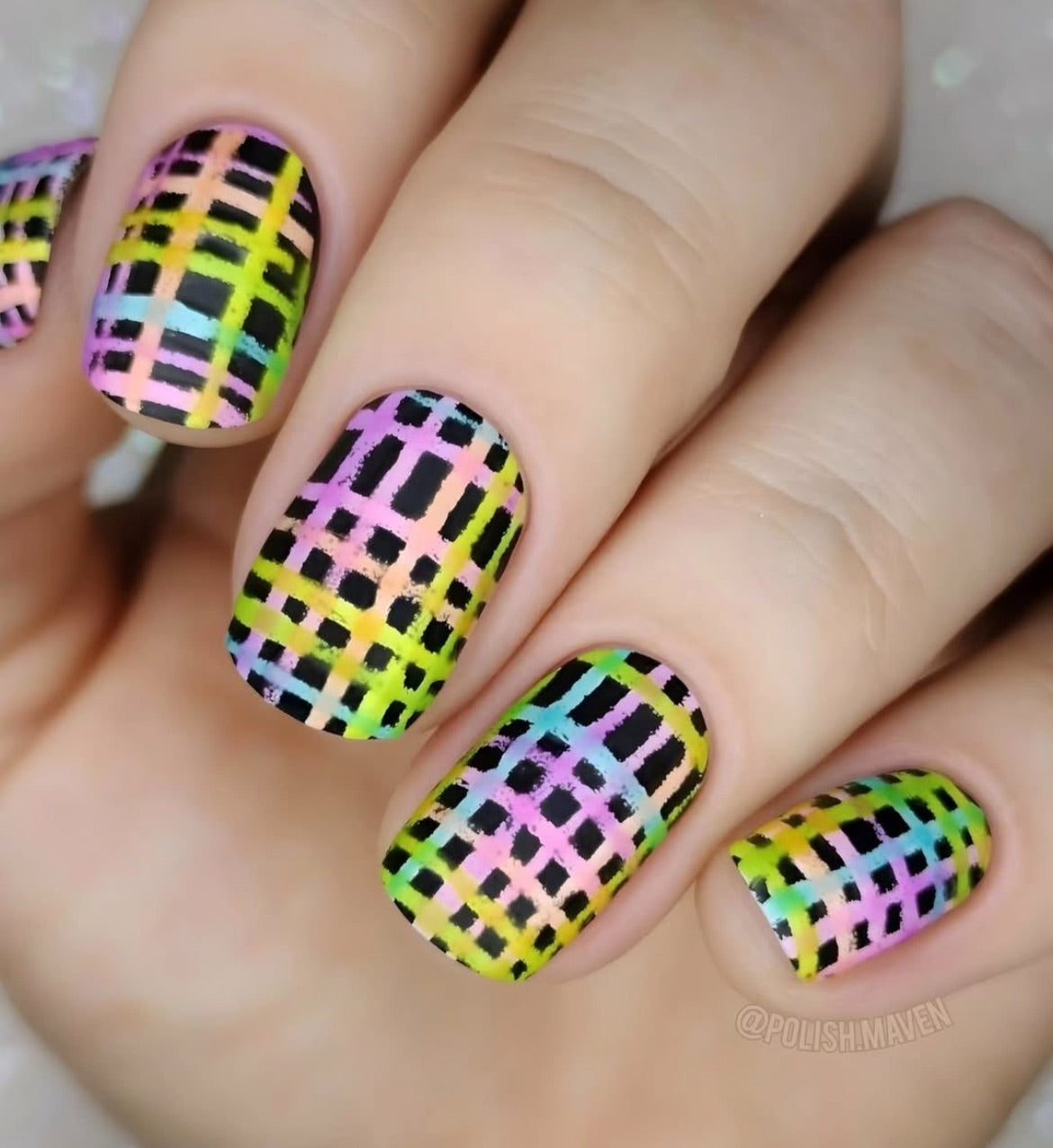 Nails with colorful layered nail art grid pattern design
