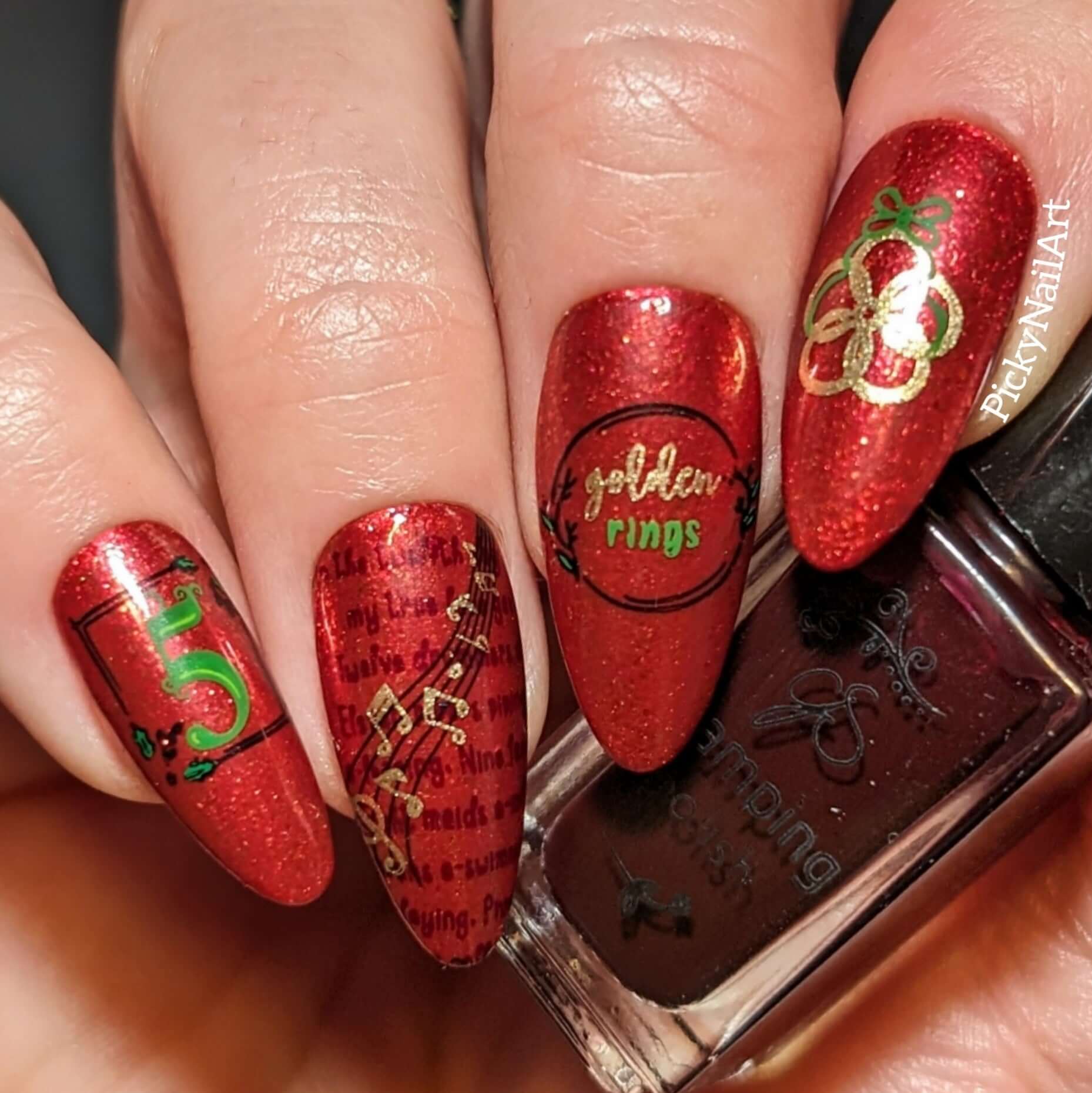 shimmery-manicure-with-christmas-nail-art-designs-of-five-gold-rings-musical-and-notes