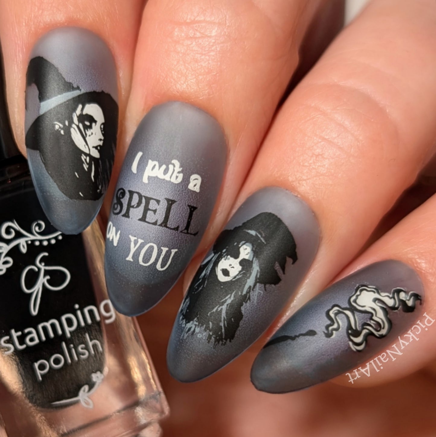 stunning-manicure-with-nail-art-designs-of-witches-a-wand-and-the-words-i-put-a-spell-on-you