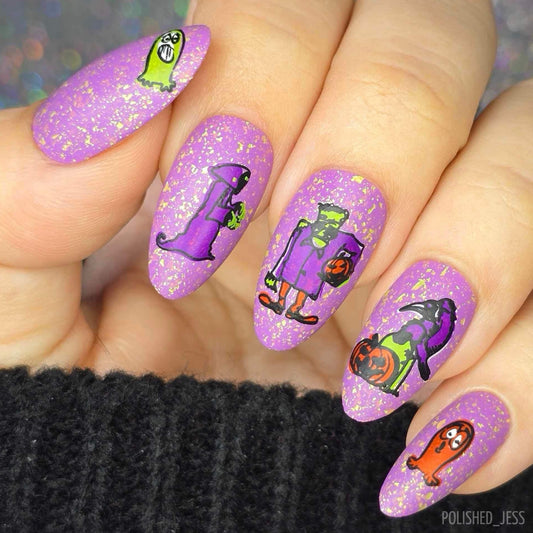 cute-manicure-with-cartoon-nail-art-designs-of-the-grim-reeper-frankstein-and-monsters