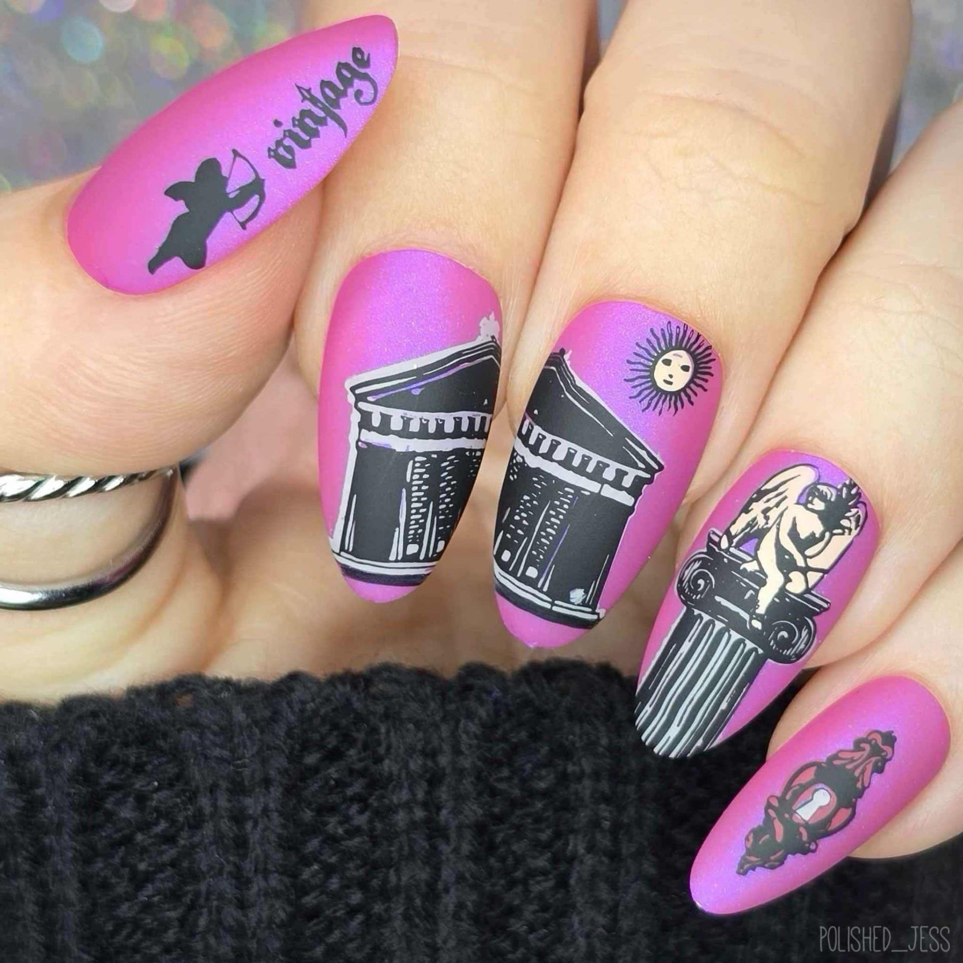 striking-manicure-with-nail-art-designs-of-a-temple-column-and-word-vintage