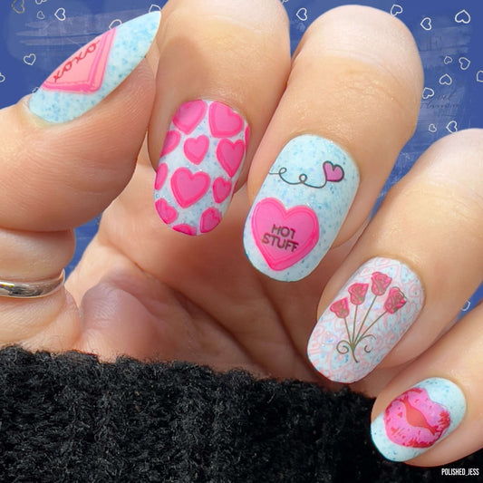 stunning-manicure-showing-nail-art-designs-of-valentines-candy-hearts-and-roses