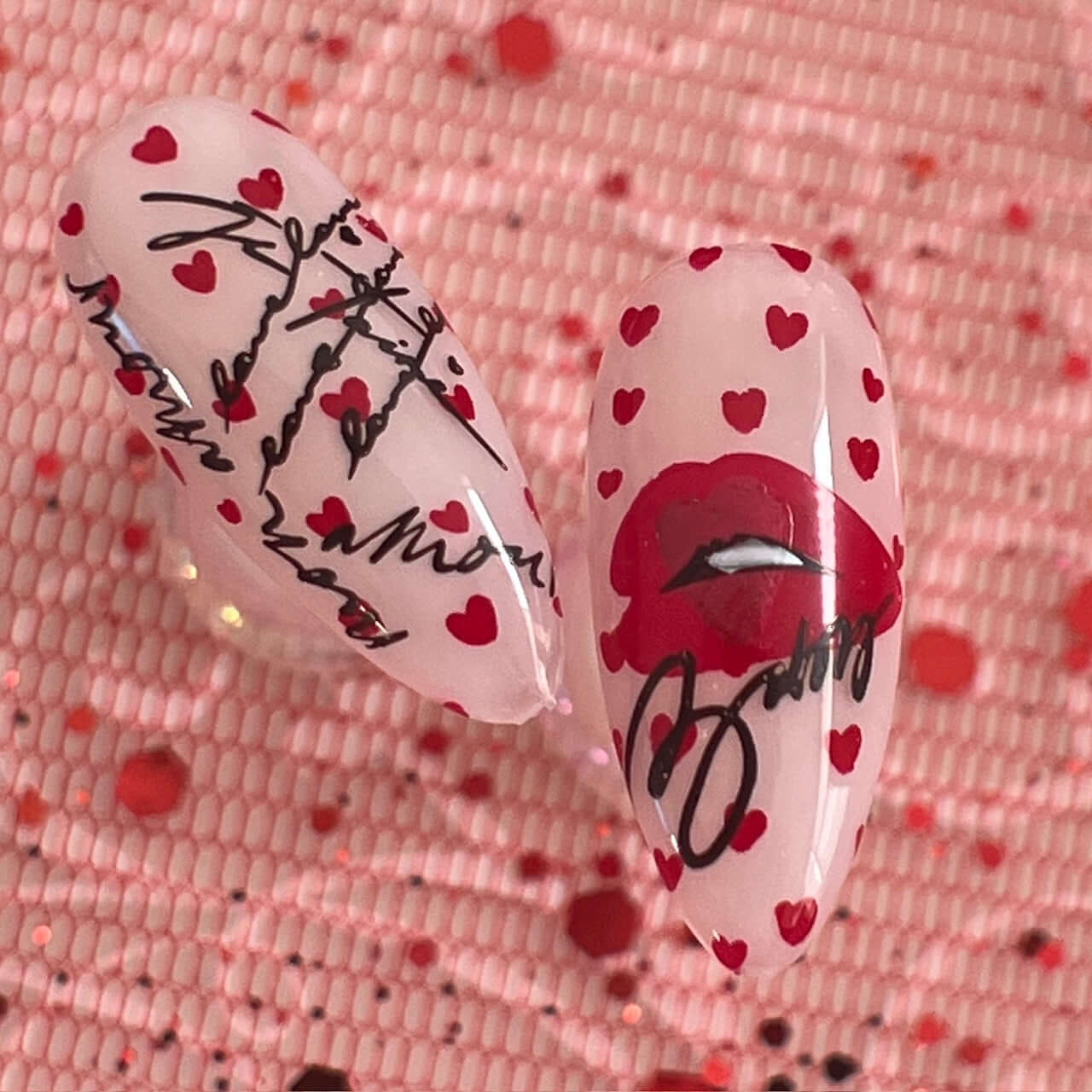 set-of-two-nail-tips-with-valentines-nail-art-desigbns-of-hearts-lips-and-words