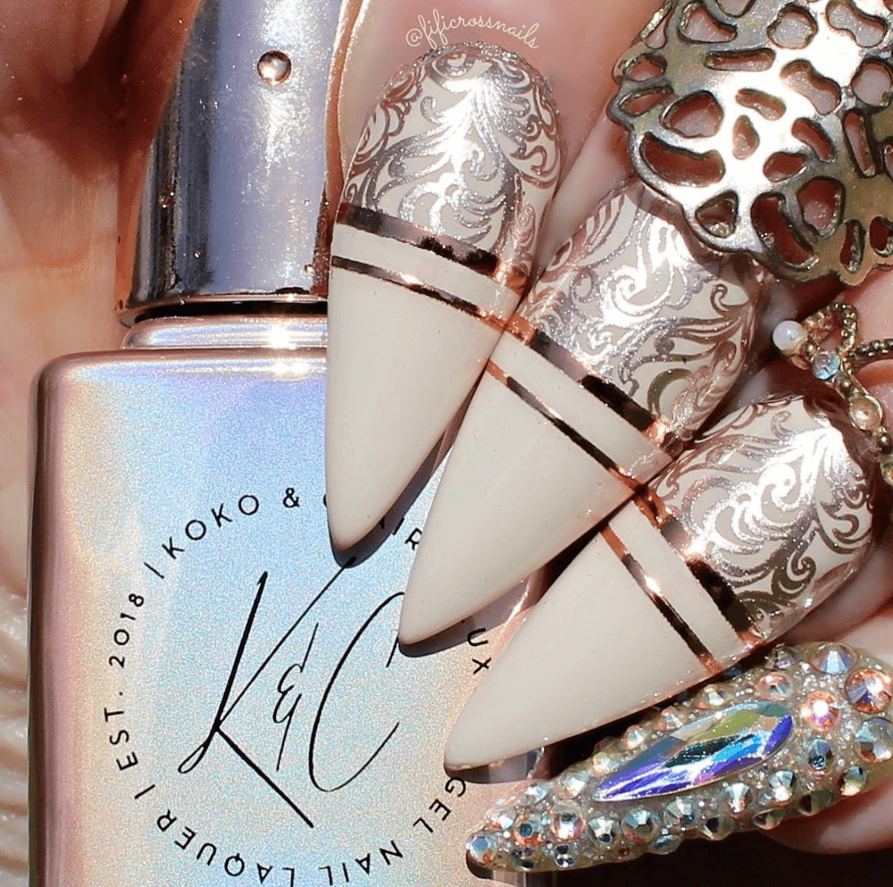 manicured-hand-with-baroque-nail-art-designs