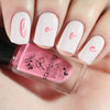 Pale-pink-manicure-showing-nail-art-design-of-the-word-love