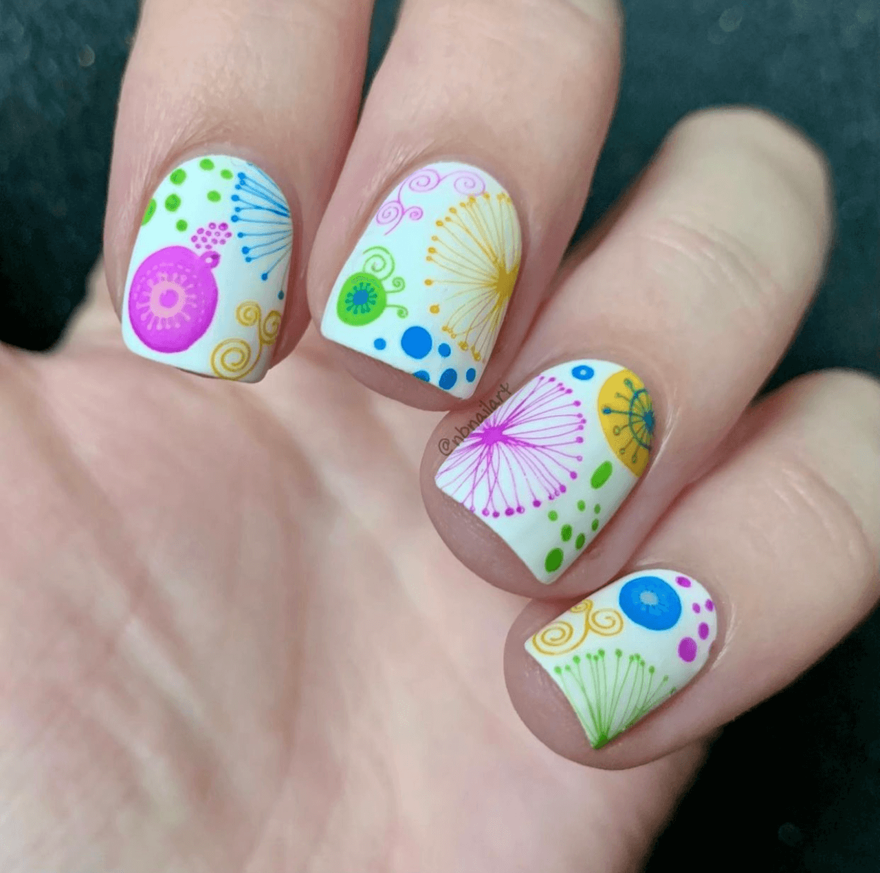 bright-manicure-with-abstract-nail-art-designs-of-swirls-blobs-spines