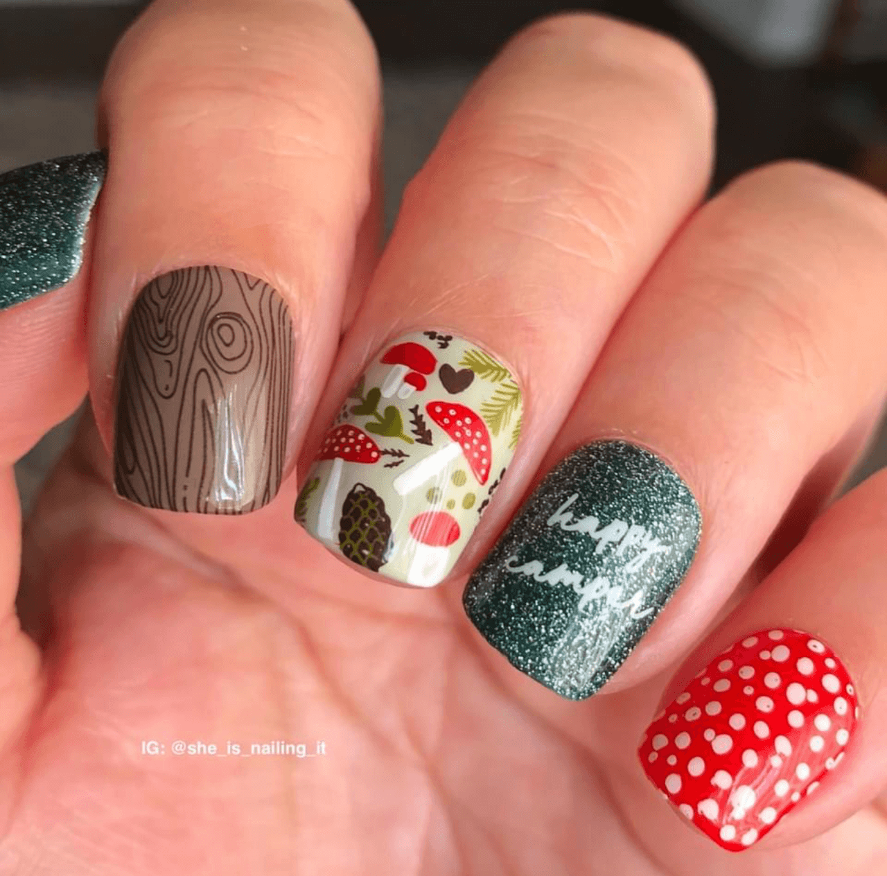 cute-manicure-with-nail-art-designs-of-mushrooms-acorns-and-the-words-happy-camper