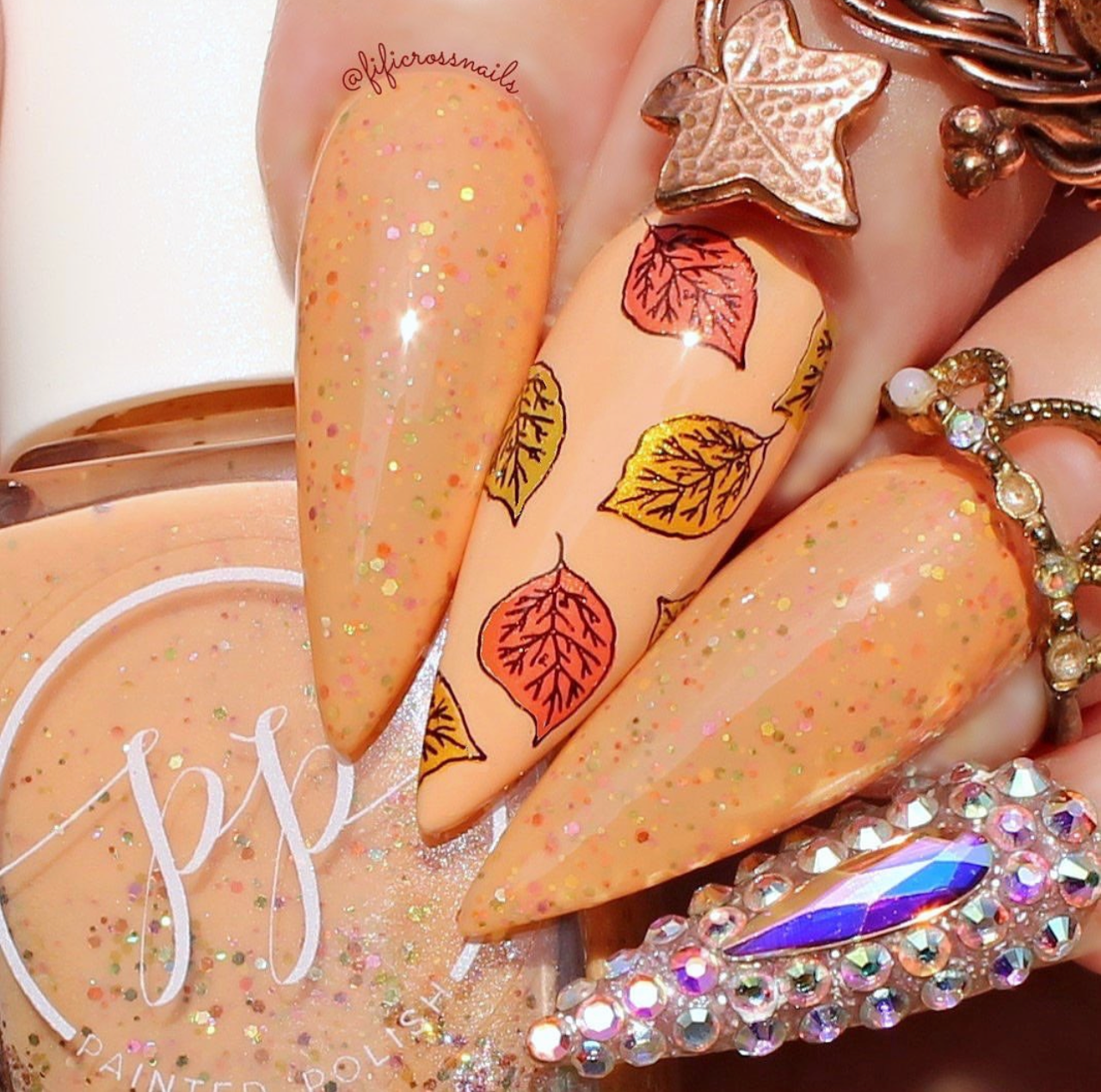 gergeous-shimmering-manicure-with-nail-art-designs-of-leaves