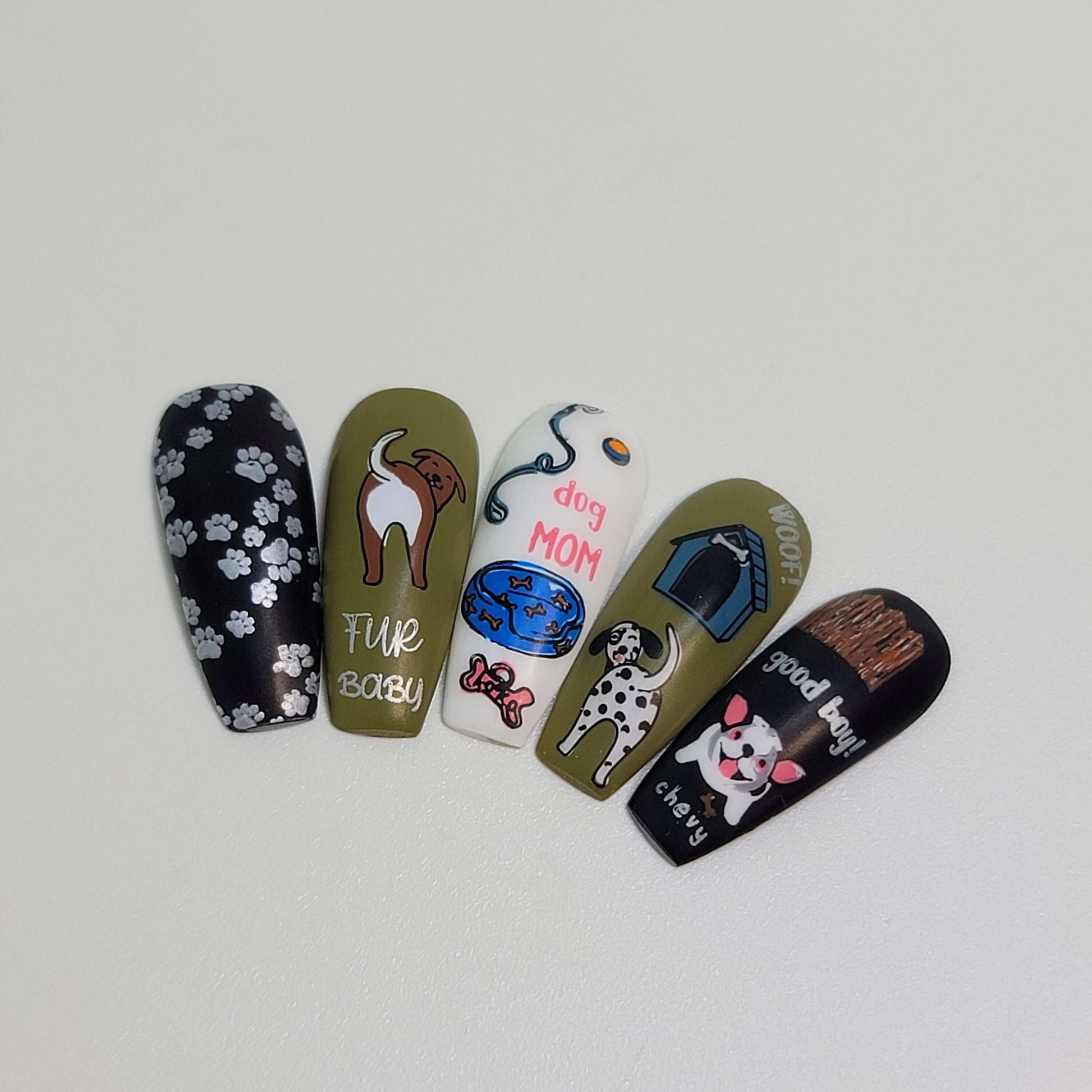 set-of-nail-tips-with-nail-art-designs-of-dogs-dog-house-paw-prints-and-words