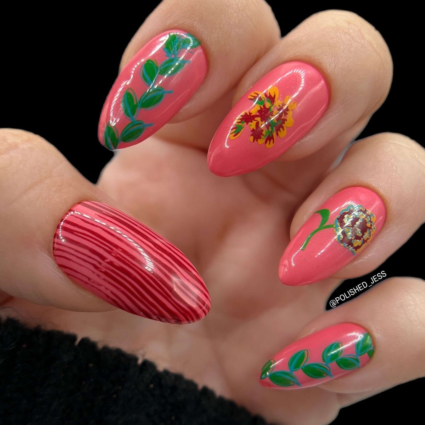 beautiful-bright-manicure-showing-nail-art-designs-of-flowers-and-leaves