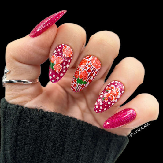 stunning-manicure-showing-nail-art-designs-of-flowers-with-dots-and-stripes