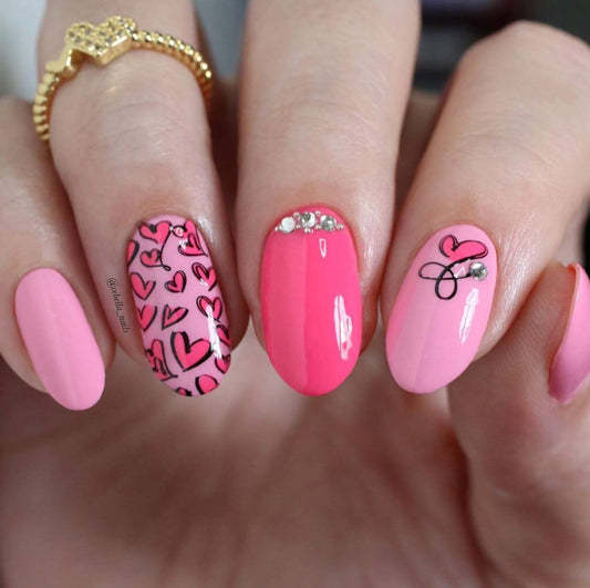 gorgeous-manicure-with-nail-art-designs of-hearts-with-gems-added