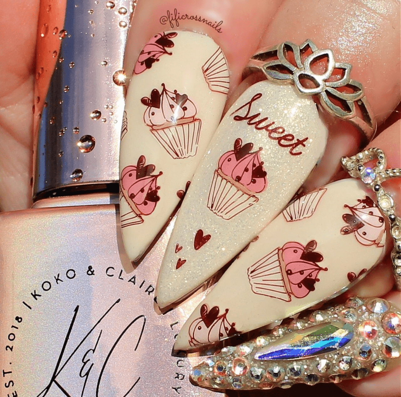 bright-manicure-with-nail-art-designs-of-cupcakes-with-heart-sprinkles-and-word-sweet