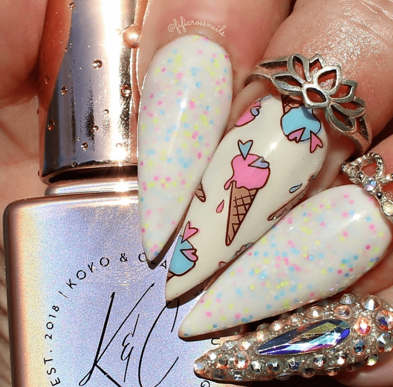 bright-manicure-with-nail-art-designs-of-ice-cream-cones-with-heart-sprinkles