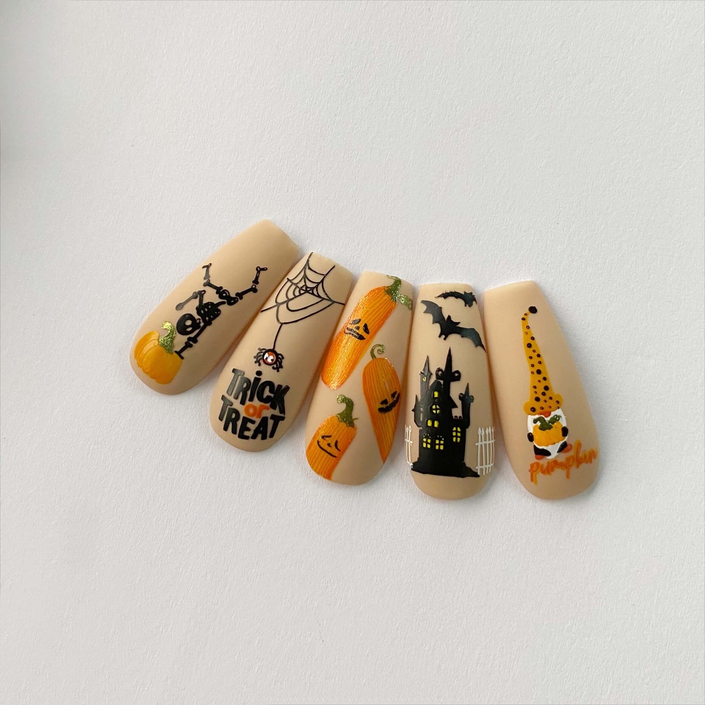 set-of-five-nail-tip-with-layered-halloween-nail-art-designs-pumpkins-skeleton-and-haunted-house
