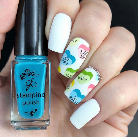 stunning-manicure-showing-nail-art-designs-of-candy-hearts-with-pharses